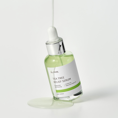 IUNIK Tea Tree Relief Serum (50ml) Product shot with the serum poured on top for the texture shot