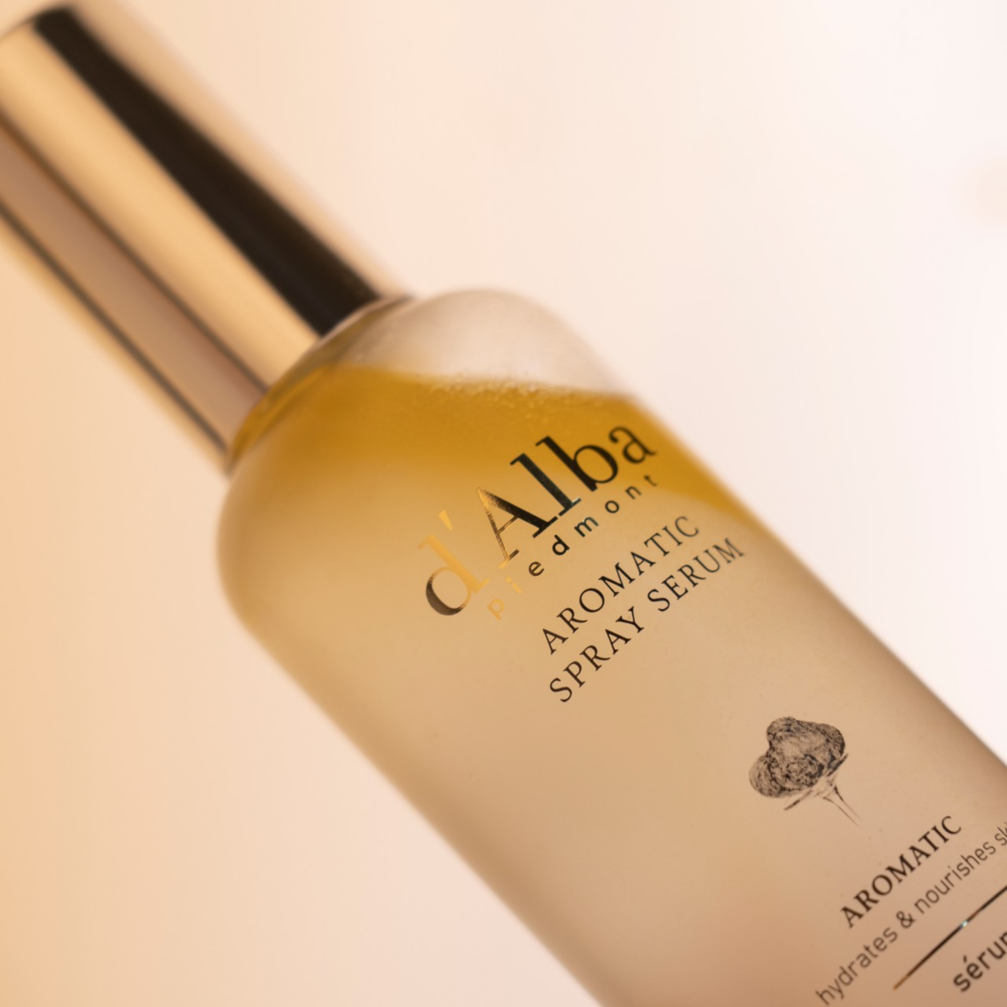 D’ALBA White Truffle First Aromatic Spray Serum Mini (60ml) close up image showing the oil and serum