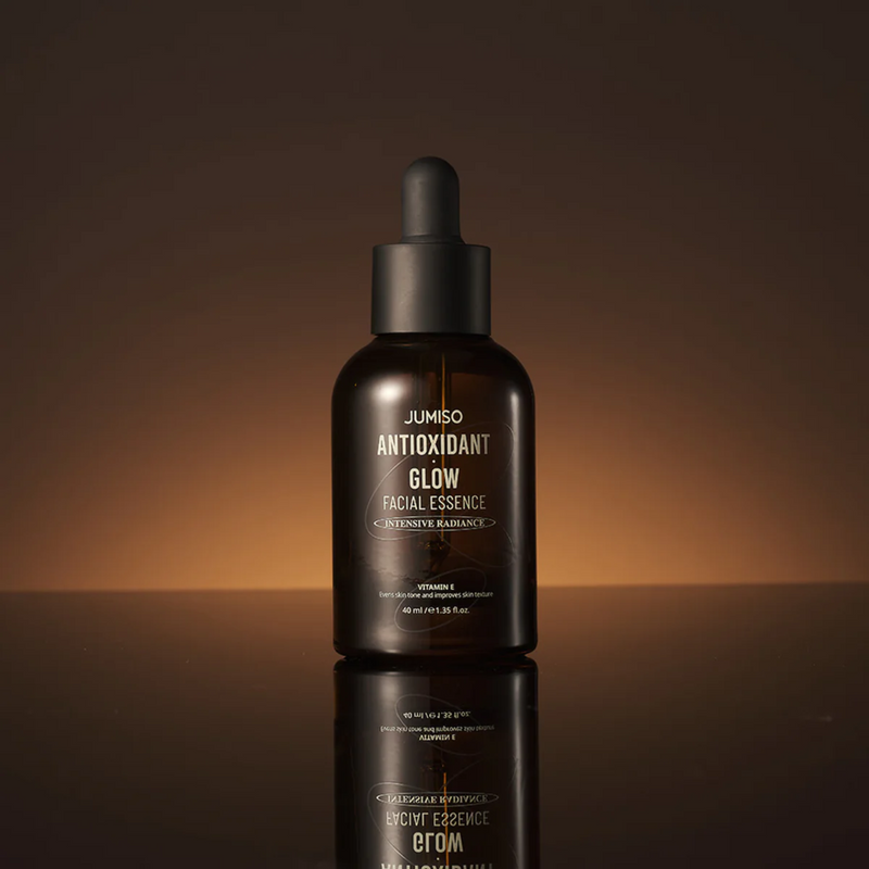 Antioxidant Glow Facial Essence in brown background