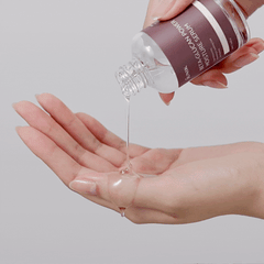 IUNIK Beta Glucan Power Moisture Serum (50ml) serum being poured onto the hand to show the texture